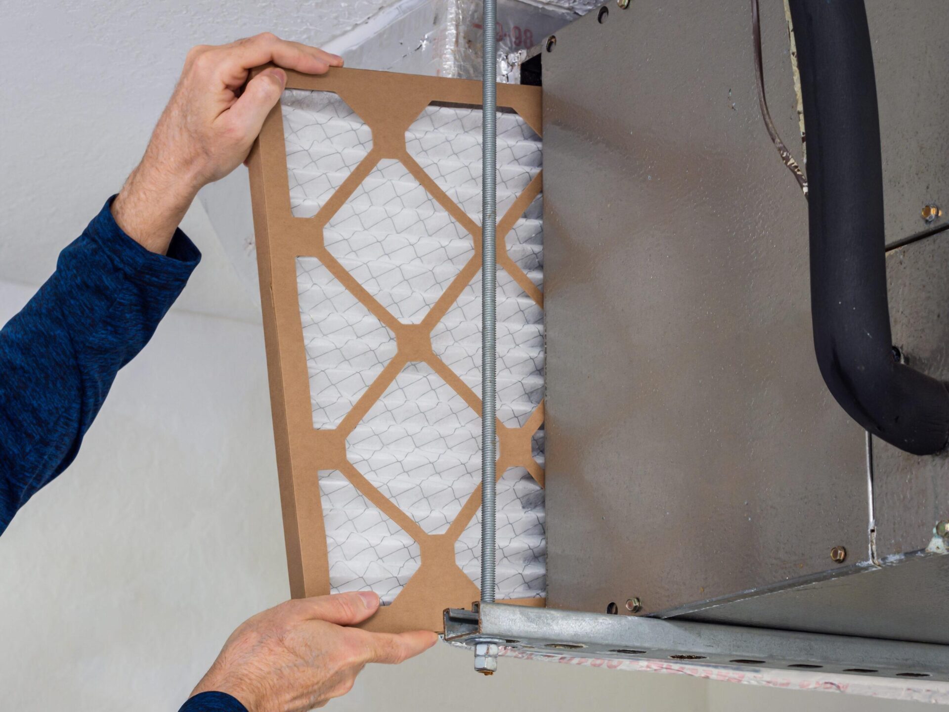 Replacing an air filter in a ducted HVAC system